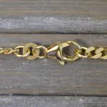 Goldkette als Panzerkette flach in Gelbgold 333 / 8K, 65 cm lang, 3,4 mm breit, Gewicht ca. 16.9 g.
