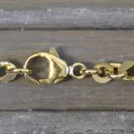 Armband als Panzerkette flach in Gelbgold 333 / 8K, 21 cm lang, 4,7 mm breit, Gewicht ca. 10.6 g.