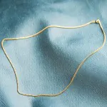 Goldkette als Panzerkette flach 1.1 Höhe in Gelbgold 585 / 14K, 75 cm lang, 2,4 mm breit, Gewicht ca. 14.5 g.
