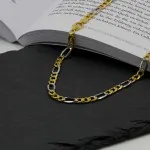 Goldkette als Figarokette hohl in Bicolor Gelbgold / Weißgold 750 / 18K, 60 cm lang, 5,7 mm breit, Gewicht ca. 17.6 g.