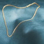 Goldkette als Zwillingspanzerkette in Gelbgold 585 / 14K, 70 cm lang, 2,1 mm breit, Gewicht ca. 4.7 g.