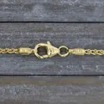 Armband als Zopfkette in Gelbgold 333 / 8 K, 18 cm lang, 1,7mm breit, Gewicht ca. 1.8 g.
