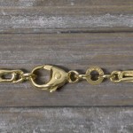 Armband als Tigeraugenkette hohl in Gelbgold 333 / 8K, 19 cm lang, 3,8 mm breit, Gewicht ca. 2.4 g.