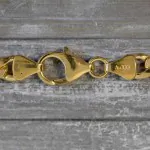 Goldkette als Figarokette hohl Bicolor in Gelbgold / Weißgold 333 / 8K, 45 cm lang, 5,7 mm breit, Gewicht ca. 8.1 g.