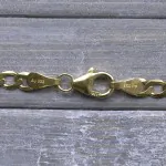 Armband als Panzerkette facettiert in Gelbgold 333 / 8K, 19 cm lang, 3,1 mm breit, Gewicht ca. 2.2 g.