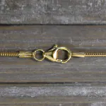 Goldkette als Schlangenkette in Gelbgold 333 / 8 Karat, 55 cm lang, 1.2 mm breit, Gewicht ca. 4.1