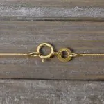 Goldkette als Schlangenkette in Gelbgold 333 / 8K, 45 cm lang, 0,8 mm breit, Gewicht ca. 1.9 g.