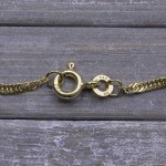 Armband als Singapurkette in Bicolor Gelbgold / Weißgold 333 / 8K, 19 cm lang, 1,8 mm breit, Gewicht ca. 1 g.