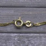 Armband als Singapurkette in Bicolor Gelbgold / Weißgold 333 / 8K, 18 cm lang, 1.8 mm breit, Gewicht ca. 1 g.