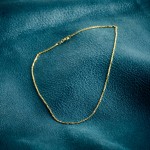 Goldkette als Ankerkette stirnseitig diamantiert in Gelbgold 585 / 14K, 50 cm lang, 1,3 mm breit, Gewicht ca. 4.5 g.