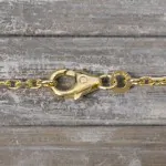 Armband als Ankerkette diamantiert in Gelbgold 333 / 8K, 18,5 cm lang, 2 mm breit, Gewicht ca. 3.4 g.