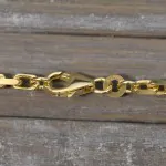 Goldkette als Ankerkette diamantiert in Gelbgold 333 / 8K, 80 cm lang, 3 mm breit, Gewicht ca. 31.4 g.