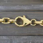 Goldkette als Ankerkette diamantiert in Gelbgold 333 / 8K, 45 cm lang, 3,8 mm breit, Gewicht ca. 29.3 g.