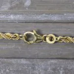Armband als Kordelkette hohl in Gelbgold 333 / 8K, 18,5 cm lang, 3,3 mm breit, Gewicht ca. 2.8 g.