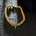 Armband als Kordelkette hohl in Gelbgold 585 / 14K, 19 cm lang, 5 mm breit, Gewicht ca. 6.9 g.
