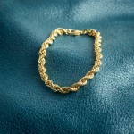 Armband als Kordelkette hohl in Gelbgold 333 / 8K, 19 cm lang, 5,4 mm breit, Gewicht ca. 6 g.