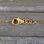 Goldkette als Panzerkette flach in Gelbgold 375 / 9K, 50 cm lang, 1,4 mm breit, Gewicht ca. 2.8 g.