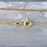 Goldkette als Panzerkette flach in Gelbgold 375 / 9K, 90 cm lang, 1,4 mm breit, Gewicht ca. 5 g.