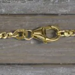 Goldkette als Panzerkette flach 1.1 Höhe in Gelbgold 375 / 9K, 50 cm lang, 2,4 mm breit, Gewicht ca. 8.1 g.