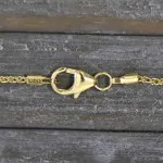 Goldkette als Zopfkette in Gelbgold 375 / 9K, 42 cm lang, 1,3 mm breit, Gewicht ca. 2.5 g.