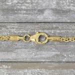 Armband als Zopfkette in Gelbgold 375 / 9K, 18,5 cm lang, 2,5 mm breit, Gewicht ca. 4.1 g.