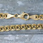 Goldkette als Zwillingspanzerkette in Gelbgold 375 / 9 Karat, 60 cm lang, 4.8 mm Breit, Gewicht ca. 8,5 g.