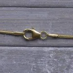 Goldkette als Schlangenkette in Gelbgold 375 / 9 Karat, 75 cm lang, 1.2 mm breit, Gewicht ca. 5.9 g.