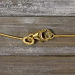 Goldkette als Tondakette in Gelbgold 375 / 9K, 45 cm lang, 0,8 mm breit, Gewicht ca. 2.8 g.
