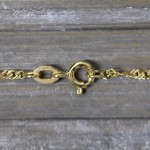 Goldkette als Singapurkette in Gelbgold 375 / 9 Karat, 95 cm lang, 1.8 mm breit, Gewicht ca. 5.2 g.