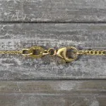 Goldkette als Figarokette diamantiert in Gelbgold 375 / 9K, 40 cm lang, 1,5 mm breit, Gewicht ca. 2 g.