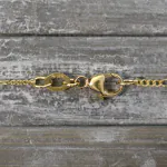 Goldkette als Figarokette diamantiert in Gelbgold 375 / 9 Karat, 50 cm lang, 1.5 mm breit, Gewicht ca. 2,6 g.