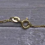 Goldkette als Figarokette diamantiert in Gelbgold 375 / 9K, 50 cm lang, 1,5 mm breit, Gewicht ca. 2.3 g.