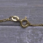 Goldkette als Figarokette diamantiert in Gelbgold 375 / 9K, 38 cm lang, 1,5 mm breit, Gewicht ca. 1.8 g.