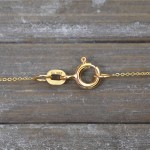 Goldkette als Ankerkette flach in Gelbgold 585 / 14K, 55 cm lang, 0,8 mm breit, Gewicht ca. 1.2 g.