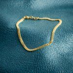 Armband als Panzerkette flach in Gelbgold 585 / 14K, 19 cm lang, 2,7 mm breit, Gewicht ca. 4.1 g.