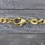 Armband als Panzerkette flach in Gelbgold 585 / 14K, 21 cm lang, 4,1 mm breit, Gewicht ca. 8.9 g.