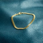 Armband als Panzerkette flach in Gelbgold 585 / 14K, 19 cm lang, 4.1 mm breit, Gewicht ca. 8.1 g.