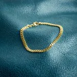 Armband als Panzerkette flach in Gelbgold 585 / 14K, 22 cm lang, 4,1 mm breit, Gewicht ca. 9.4 g.