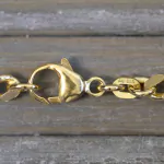 Goldkette als Panzerkette flach in Gelbgold 585 / 14 Karat, 65 cm lang, 4.7 mm breit, Gewicht ca. 38,6 g.