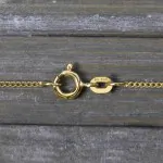 Goldkette als Panzerkette flach in Gelbgold 585 / 14K, 60 cm lang, 1,2 mm breit, Gewicht ca. 3.1 g.