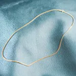 Goldkette als Panzerkette flach in Gelbgold 333 / 8K, 70 cm lang, 2,1 mm breit, Gewicht ca. 8.1 g.