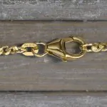 Goldkette als Panzerkette flach 1.1 Höhe in Gelbgold 585 / 14K, 50 cm lang, 2,4 mm breit, Gewicht ca. 9.6 g.