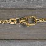 Goldkette als Panzerkette flach 1.1 Höhe in Gelbgold 585 / 14K, 85 cm lang, 2,4 mm breit, Gewicht ca. 16.4 g.