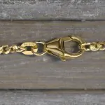 Goldkette als Panzerkette flach 1.1 Höhe in Gelbgold 585 / 14K, 85 cm lang, 2,4 mm breit, Gewicht ca. 16.4 g.