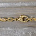 Goldkette als Kordelkette hohl in Bicolor Gelbgold / Weißgold 585 / 14K, 50 cm lang, 3,3 mm breit, Gewicht ca. 13.3 g.