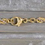Goldkette als Kordelkette hohl in Bicolor Gelbgold / Weißgold 585 / 14K, 50 cm lang, 4,4 mm breit, Gewicht ca. 20.3 g.
