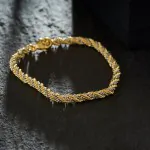 Armband als Kordelkette hohl Bicolor in Gelbgold / Weißgold 585 / 14K, 21 cm lang, 4,4 mm breit, Gewicht ca. 8.8 g.