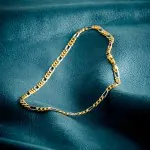 Goldkette als Figarokette hohl Bicolor in Gelbgold / Weißgold 333 / 8K, 50 cm lang, 5,7 mm breit, Gewicht ca. 9.1 g.
