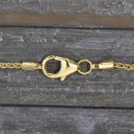 Goldkette als Zopfkette in Gelbgold 585 / 14 Karat, 75 cm lang, 1.3 mm breit, Gewicht ca. 5 g.