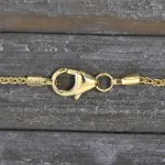 Goldkette als Zopfkette in Gelbgold 585 / 14K, 38 cm lang, 1,3 mm breit, Gewicht ca. 2.5 g.